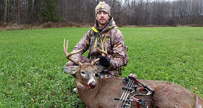 whitetail deer bowhunter